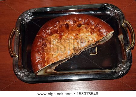 Fresh, tender delicious piece of cake is on the tray.