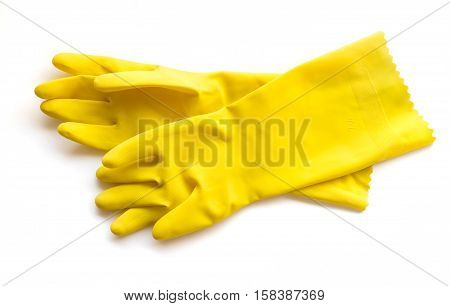 Yellow rubber gloves for cleaning on white background workhouse concept