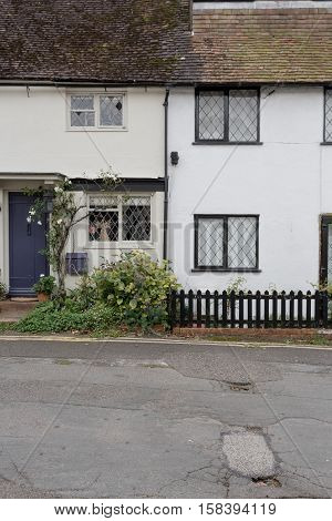 Winslow, Buckinghamshire, United Kingdom, October 25, 2016: Two Cottages With Tiny Front Gardens On