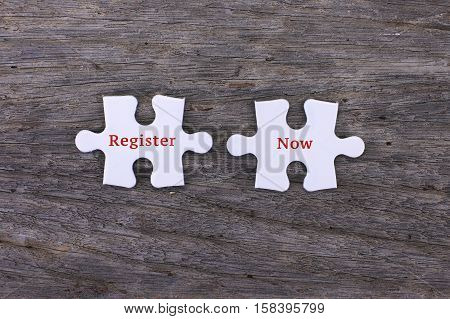 Missing white puzzle with positive Register Now and copyspace area