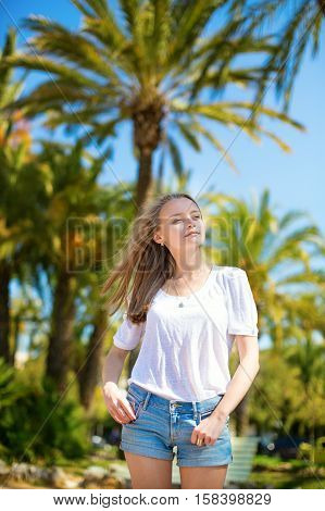 Girl Enjoying Her Vacation On A Tropical Resort
