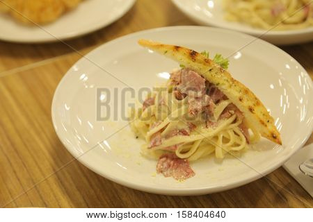 Spaghetti pasta with smoked beef ham and egg