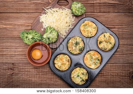 Delicious egg muffins broccoli and cheese. Concept of cooking.