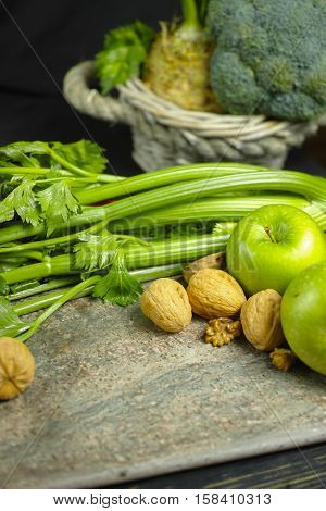 Green vegetables and fruits - celery apples celery root celeriac broccoli healthy diet concept