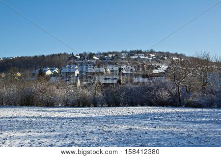Winter landscape / Town Niederstetten (Germany) .