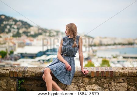 Girl Looking At The City Of Cannes