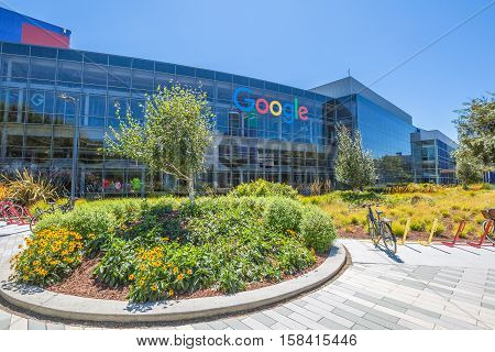 Mountain View, California, USA - August 15, 2016: Google sign on one of the Google buildings. Exterior view of a Google headquarters building. Google is specializing in Internet services