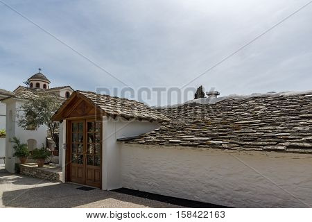 Church andspring flowers in Archangel Michael Monastery in Thassos island, East Macedonia and Thrace, Greece