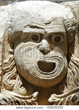 Stone mask - decoration ancient Roman theater in Demre. Turkey