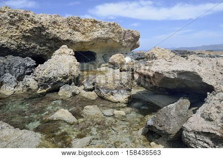 Eroded Rocky Beach at Cape Drepanon Agios Georgios Pegeia Cyprus