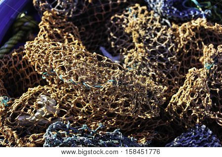 Jumble of nets and lines aboard fishing boat