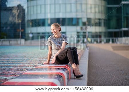 Girl Walking At La Defense In Paris