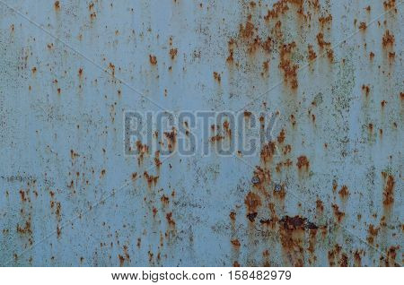Blue painted rusty metal. Detailed photo texture.