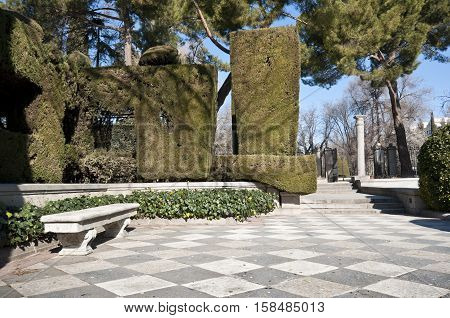 Stone bench in Cecilio Rodriguez Gardens Retiro Park Madrid Spain
