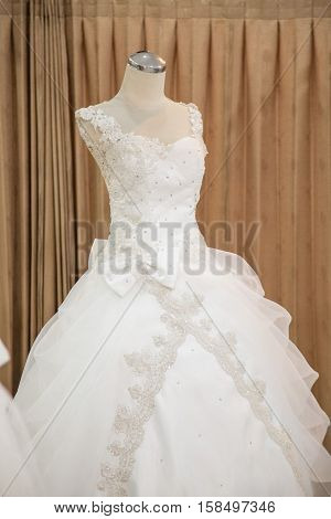 Beautiful Wedding dress on mannequin display boutique