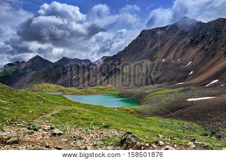 Beautiful lake in mountain tundra of Eastern Siberia. Sayan. Russia