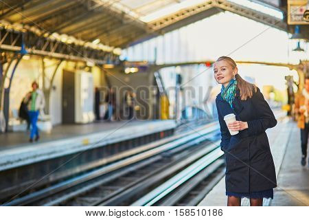 Beautiful Young Woman Waiting For A Train