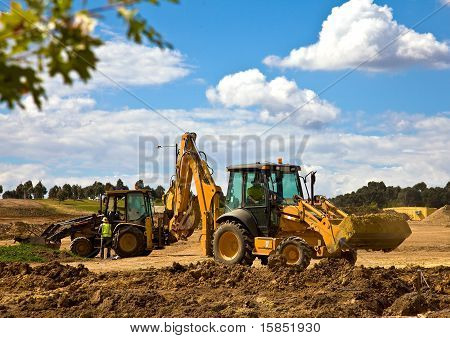 Front end loader with backhoe