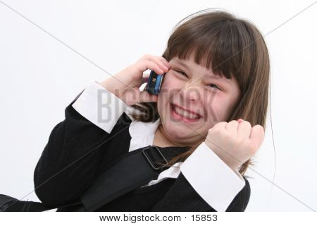 携帯電話の女の子 （7 歳）