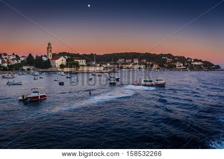 Waterfront view at marble scenery in famous european travel destination, Hvar town, Croatia evening time.
