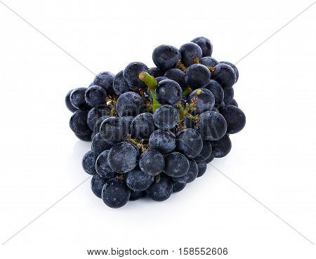 Bunch of black grapes on a white background isolated