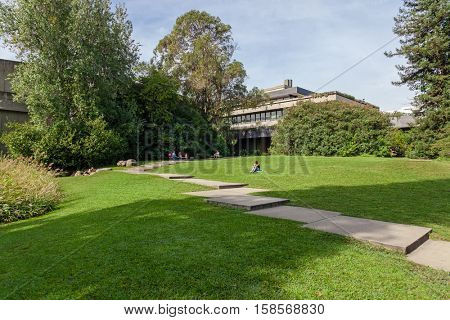 Lisbon, Portugal - October 19, 2016: Calouste Gulbenkian foundation garden with a view of the lawns. An urban park open to the public, and very popular especially among College students.