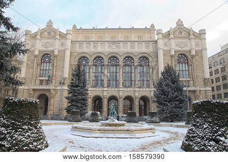 BUDAPEST, HUNGARY - JANUARY 5, 2016: Vigado Concert Hall with fountain statue on the Danube Promenade in winter, Budapest, Hungary.