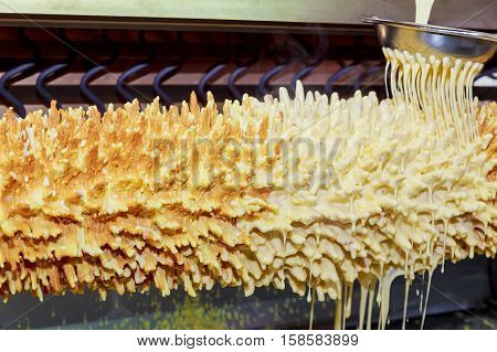 Cooking Traditional Lithuanian Cake On Skewer, Selective Focus In Motion