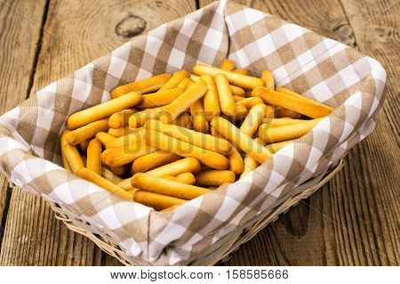 Crispy bread sticks with salt and spices. Studio Photo