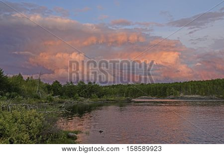 Pink Storm Clouds at Sunset on Kawnipi Lake in Quetico Provincial Park in Ontario