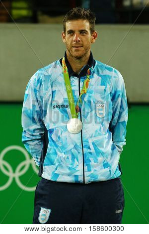 RIO DE JANEIRO, BRAZIL - AUGUST 14, 2016: Silver medalist Juan Martin Del Potro of Argentina during tennis men's singles medal ceremony of the Rio 2016 Olympic Games at the Olympic Tennis Centre