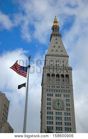 The Metropolitan Life Insurance Company Tower, built in 1911, also known as the Met Life Tower, is a landmark skyscraper located at One Madison Avenue in Manhattan in New York City, USA
