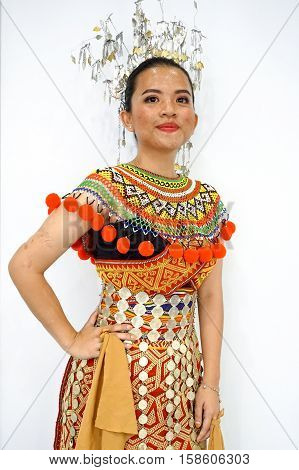 Labuan,Malaysia-Nov 26,2016:Lady from the Iban ethnic of Sarawak Borneo in traditional costume during Borneo festival in Labuan.The Iban community lived in longhouses located in Sarawak,Malaysia.