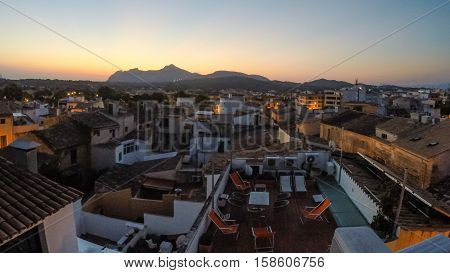 Panorama of Alcudia Old Town in Majorca Mallorca Balearic island of Spain. Beautiful Sunrise townscape.