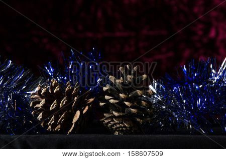 New Year Two Pine And Tinsel On A Red Background