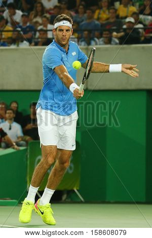 RIO DE JANEIRO, BRAZIL - AUGUST 14, 2016: Grand Slam champion Juan Martin Del Potro of Argentina in action during his men singles final match of the Rio 2016 Olympic Games at the Olympic Tennis Centre