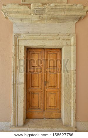 Old wooden door of a medieval church