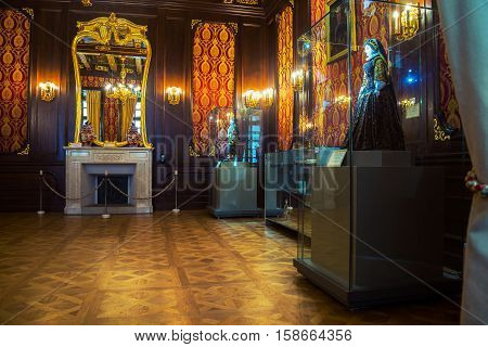 NESVIZH, BELARUS - DECEMBER 19, 2015: Inside a Nesvizh Castle in Belarus. Beautiful interior decorations, mirror on the wall. Popular landmark