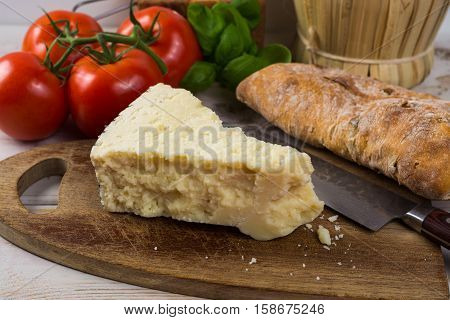 Best Italian food - fresh pecorino cheese on olive wood board