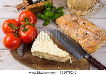 Best Italian food - fresh pecorino cheese on olive wood board