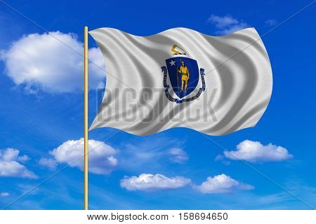 Flag of the US state of Massachusetts. American patriotic element. USA banner. United States of America symbol. Massachusettsan official flag on flagpole waving blue sky background. Fabric texture. 3D rendered illustration