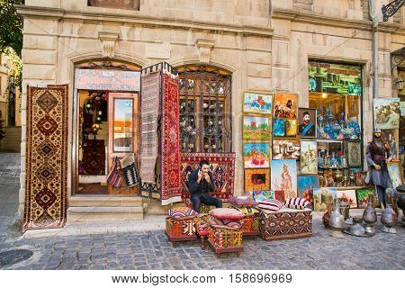 BAKU,AZERBAIJAN- OCT, 2016: Souvenir shop in Icheri Sheher (Old Town) of Baku on Oct 3, 2016, Azerbaijan. Typical tourist shop with souvenirs and antiques.