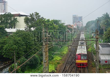 railway with train after rain in depok indonesia photo