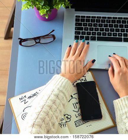 young designer working at his desk with a computer.