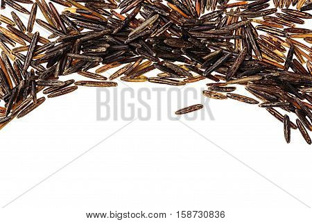 Border of black rice close-up on white background. Isolated. Decorative frame of wild brown unpolished rice.