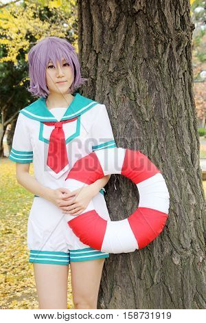 Marugame, Kagawa, Japan -  November 20, 2016: Young japanese girl dressed in cosplay costume at Mamugame-Jou Park. Photo taken in Marugame Cosplay Convention