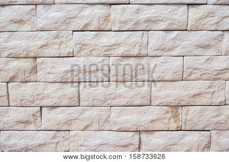 Vintage Brick Or Besser Block Wall With White Plaster, Horizontal Texture. Background Of Light Moder