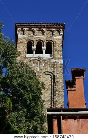 Saint Zechariah beautiful medieval bell tower and old chimney in Venice