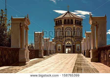 Famous orthodox monastery of Kykkos, Holy monastery of the Virgin of Kykkos in Cyprus. Way to the church near king Macarius grave. Travel sightseeing image