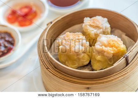 Chinese dim sum Shumai - Steamed Chinese groumet cuisine